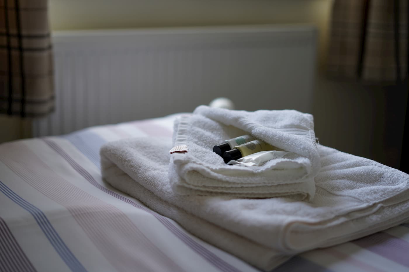 Towels on bed in Ocean Recovery Centre Blackpool